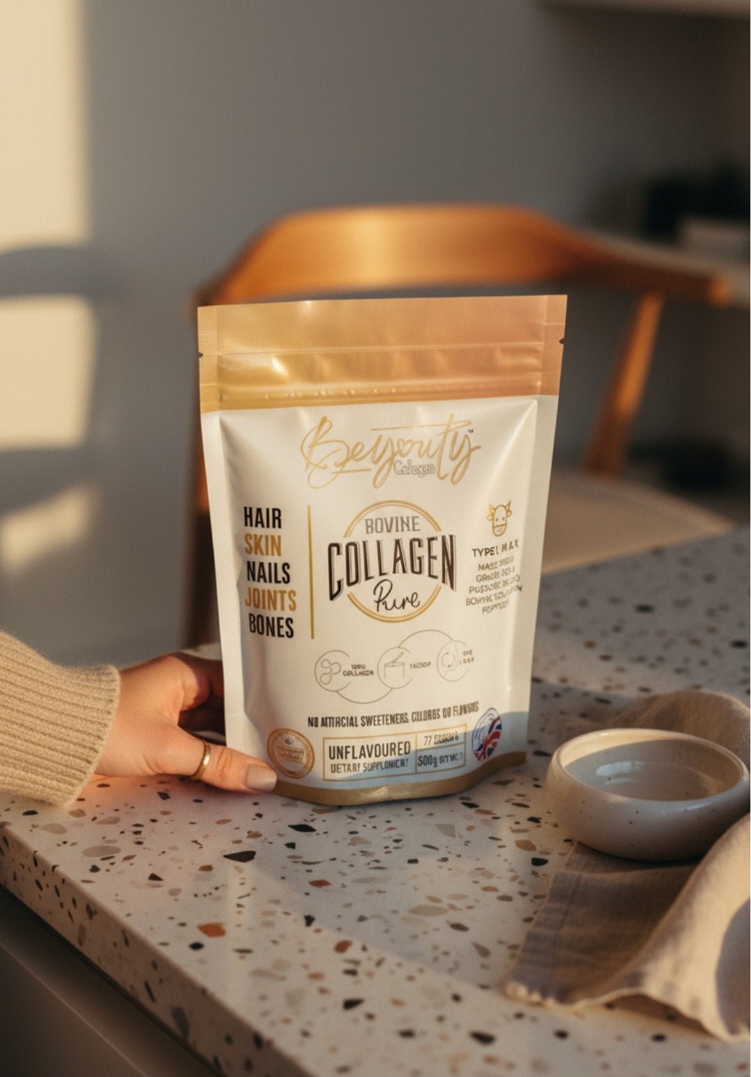 Package of Collagen Pouch on a kitchen counter with a hand holding it. Unflavoured Halal Collagen, Halal Collagen Supplements, Hydrolysed Bovine Collagen Peptides Powder, Hydrolysed Marine Collagen Peptides Powder,
Hydrolysed Multi Bovine & Marine Collagen Peptides Powder, Hydrolysed Collagen Peptides Powder UK, Buy Halal Collagen UK, Pure Hydrolysed Collagen "Halal collagen powder UK – BeYouty Collagen"